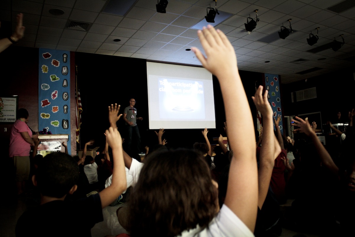 Florida school students celebrating fundraising achievement with TB&D