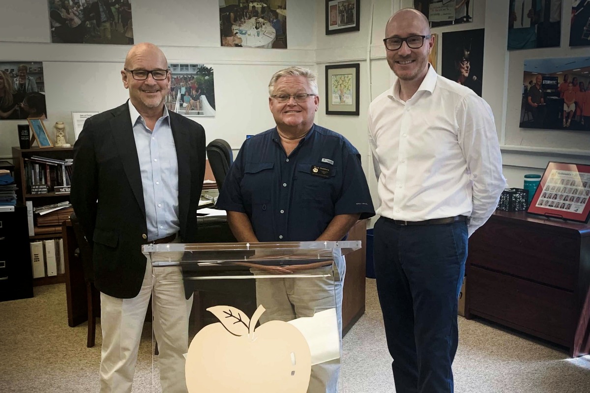 Florida school administration recognition with Three Boys & A Dog fundraising team